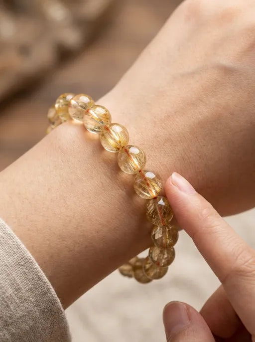 Natural Golden Rutilated Quartz Beaded Bracelet by Crystal Lumina | Genuine Venus Hair Quartz | Wealth Attraction & Energy Healing Gif